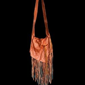 Handmade leather bag with fringe